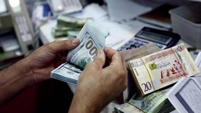 ليبيا: الاتفاق على سعر الصرف بـ 4.48 دينار لكل دولار